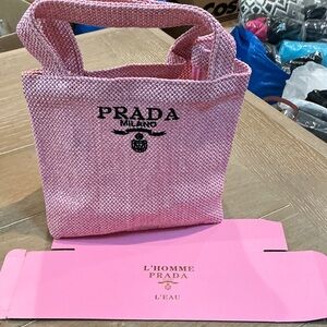 Prada small pink woven textured lunch tote with box.   GWP